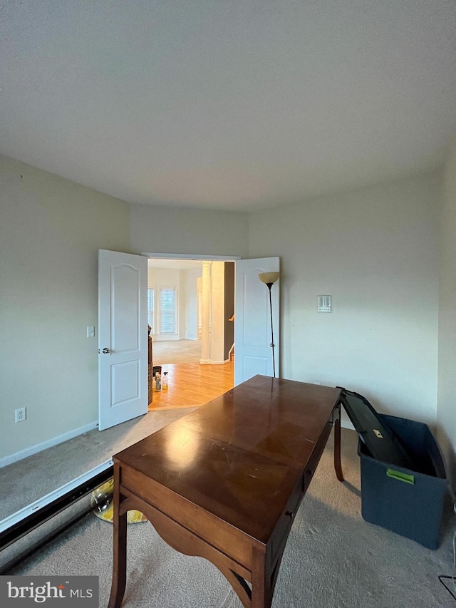 home office featuring light colored carpet