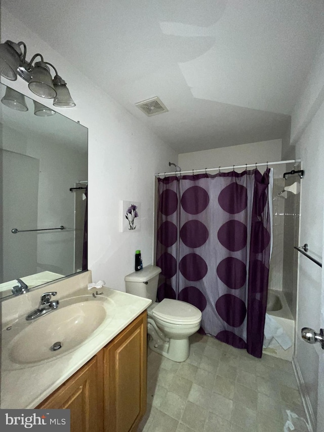 full bathroom with shower / bath combo with shower curtain, vanity, a textured ceiling, and toilet