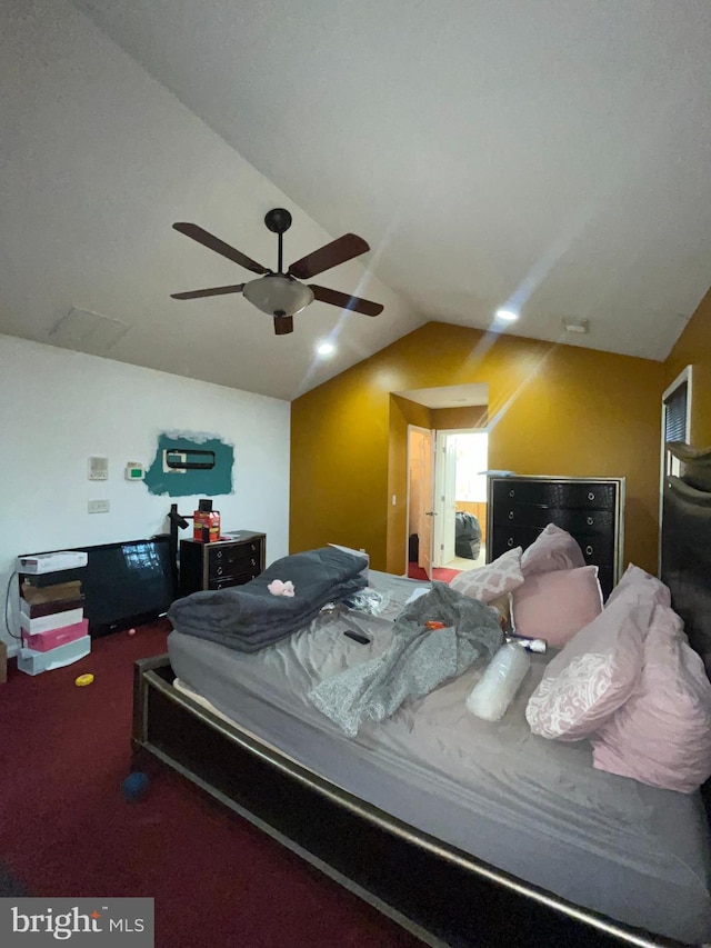 carpeted bedroom with ceiling fan and lofted ceiling