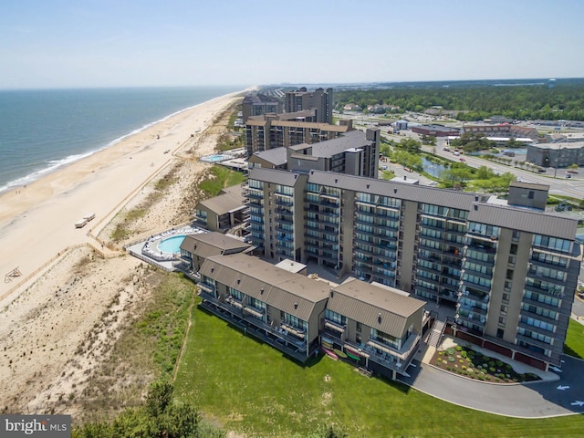 bird's eye view with a beach view and a water view