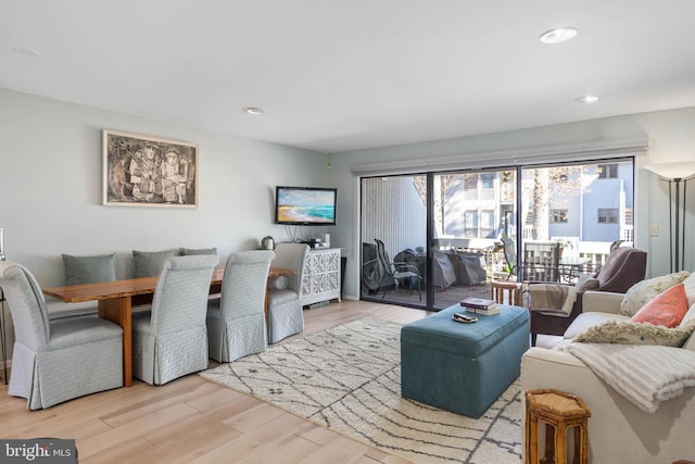 living room with light hardwood / wood-style floors