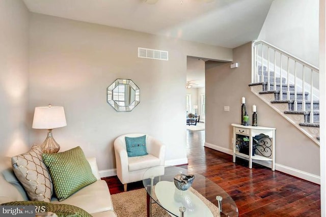 living room with dark hardwood / wood-style floors