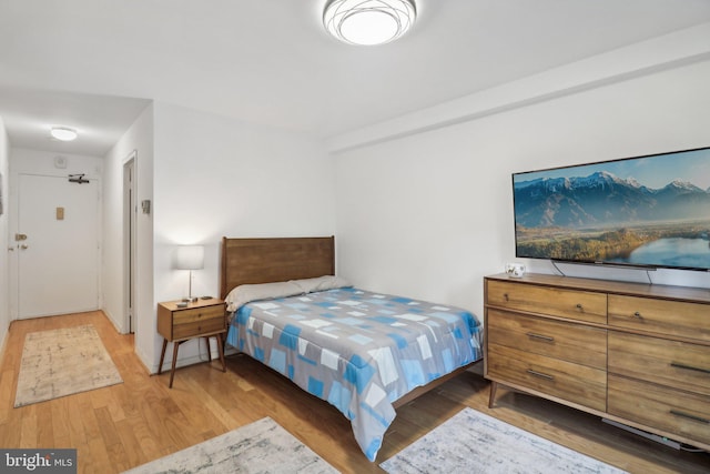 bedroom featuring hardwood / wood-style flooring