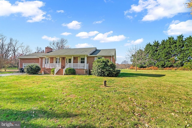 ranch-style home with a porch, a garage, and a front lawn