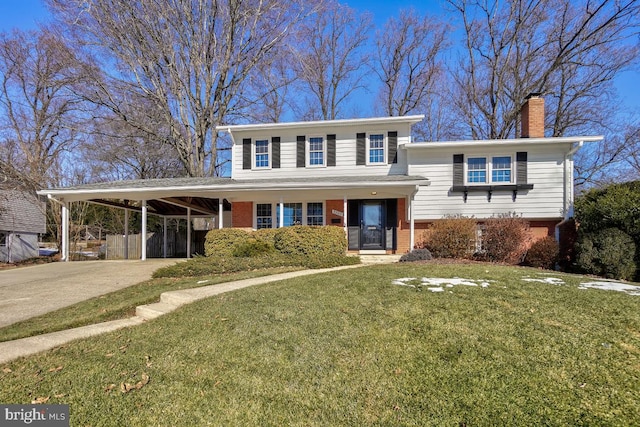 view of front facade featuring a front yard and a carport