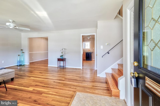 entryway featuring light hardwood / wood-style floors and ceiling fan