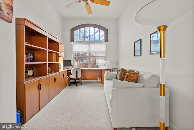 office area with light colored carpet and ceiling fan