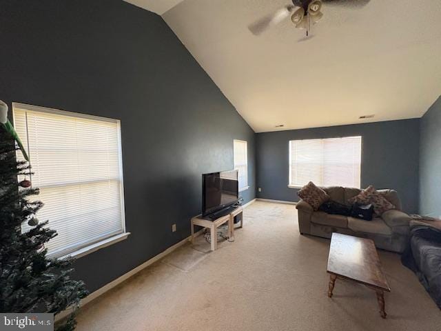 living room with light carpet, ceiling fan, and lofted ceiling