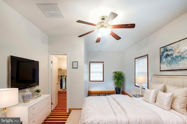 bedroom featuring ceiling fan and light wood-type flooring