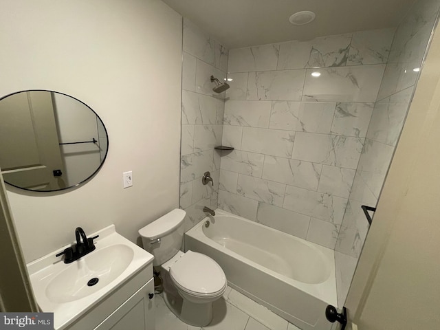 full bathroom with vanity, tiled shower / bath combo, and toilet