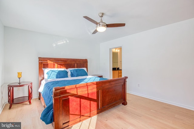 bedroom with light hardwood / wood-style floors and ceiling fan