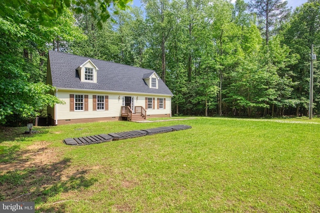 65 Francis, Montross, VA 22520 - new england style home featuring crawl space, a front lawn, and a shingled roof