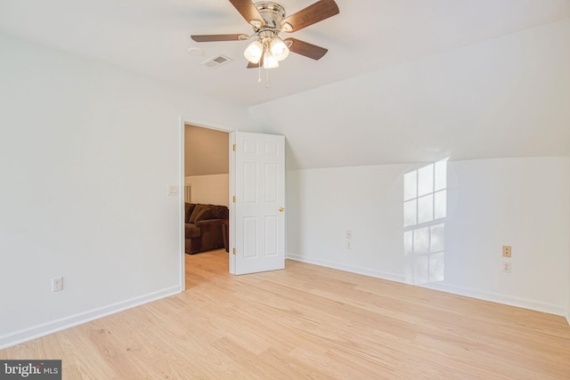 bonus room with ceiling fan, lofted ceiling, and light hardwood / wood-style flooring