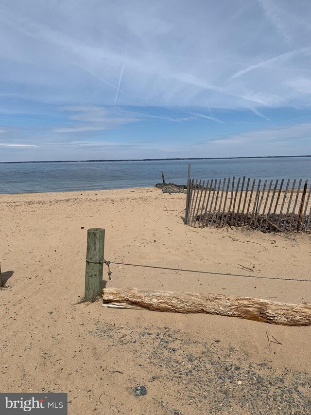 property view of water with a beach view