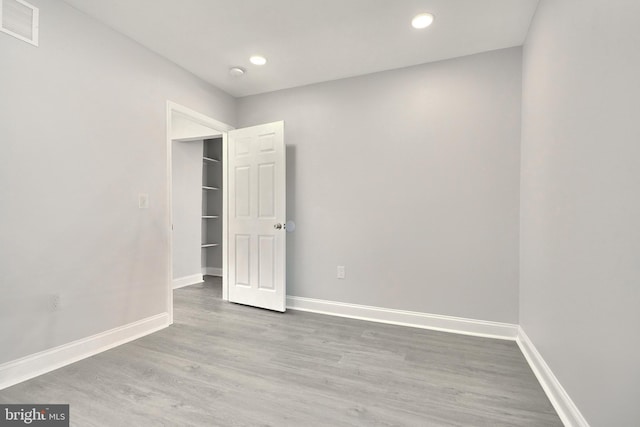 empty room featuring hardwood / wood-style floors