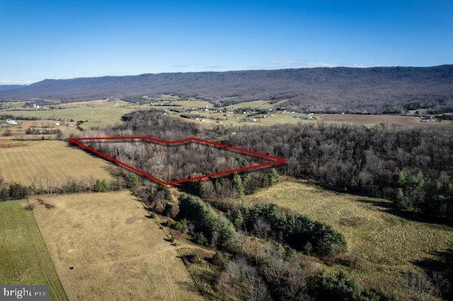 aerial view featuring a mountain view and a rural view