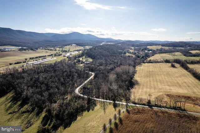 drone / aerial view featuring a mountain view and a rural view