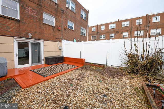 view of yard with a wooden deck