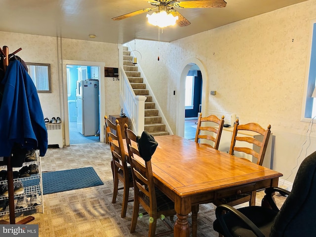 dining space with ceiling fan