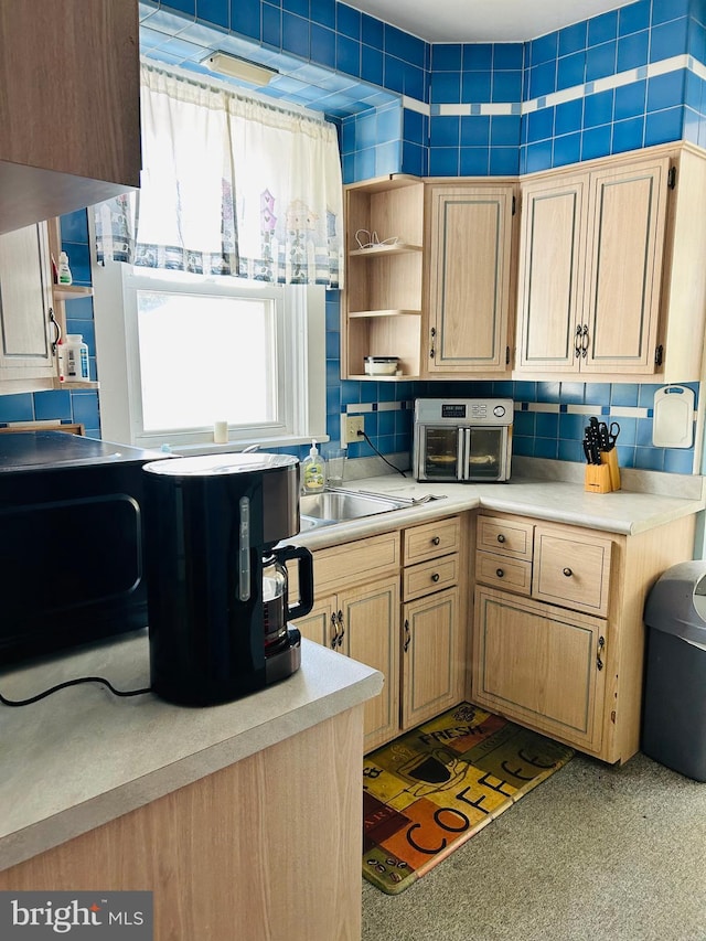 kitchen with light brown cabinetry