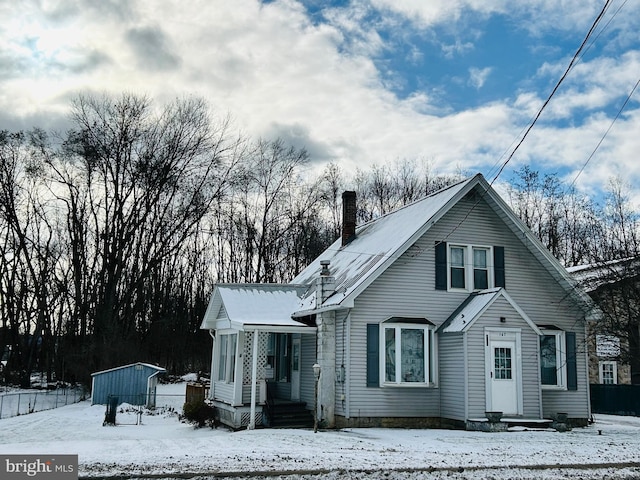 exterior space with a shed