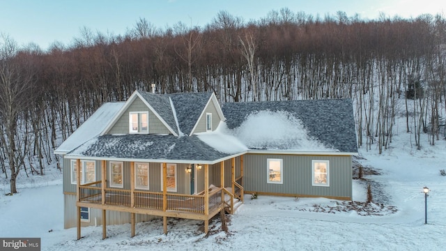 view of snow covered property