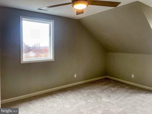 bonus room featuring ceiling fan, carpet floors, and lofted ceiling