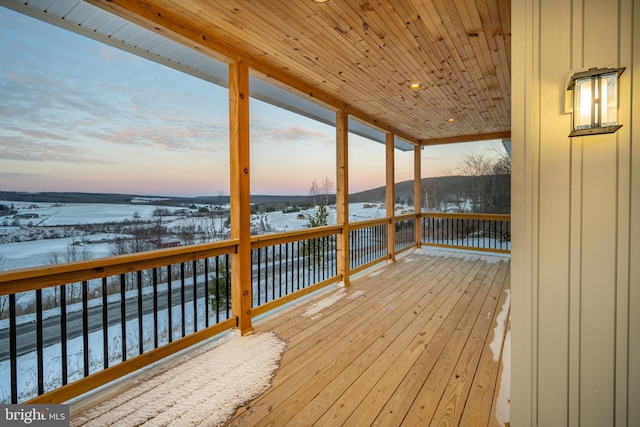 view of snow covered deck