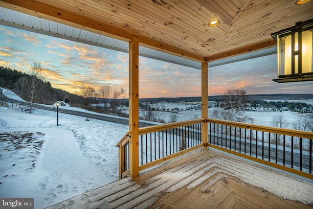 view of snow covered deck