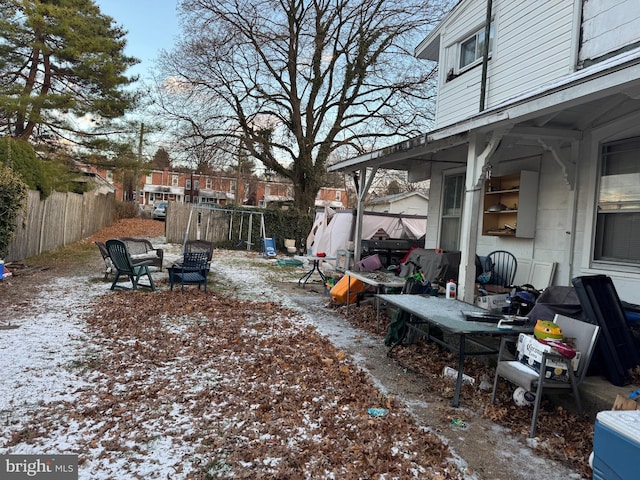 view of yard covered in snow