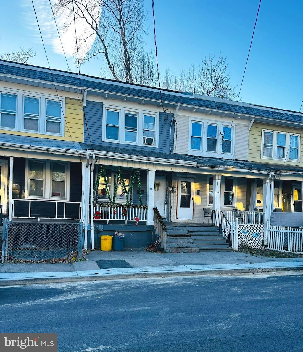 view of property with covered porch