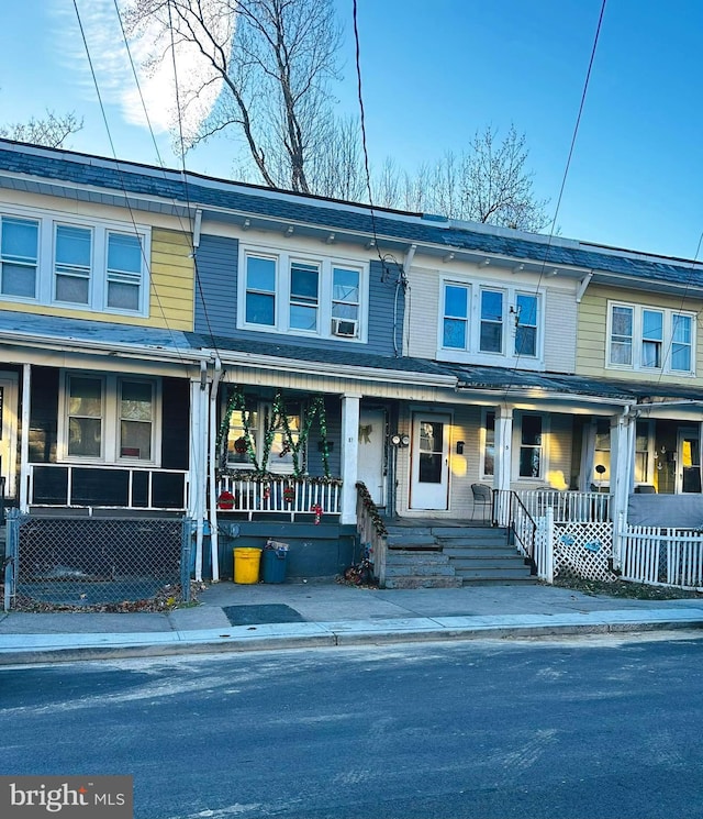 view of property with covered porch