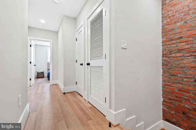 corridor featuring light wood-type flooring