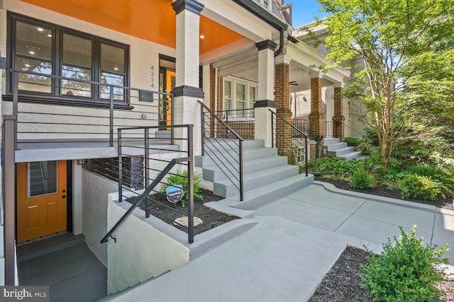 property entrance with covered porch