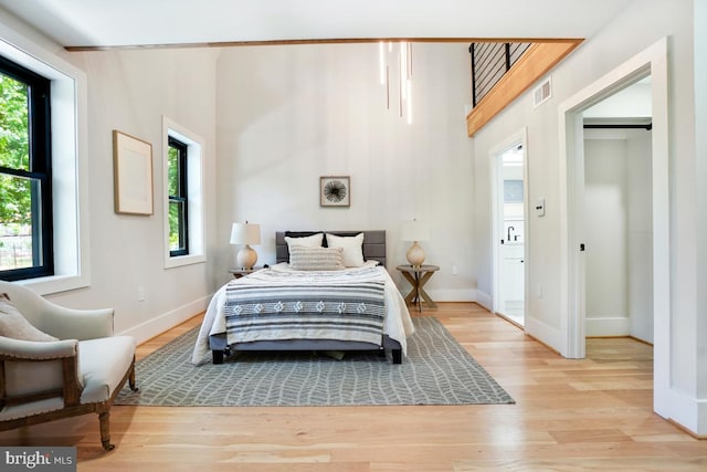 bedroom with light wood-type flooring