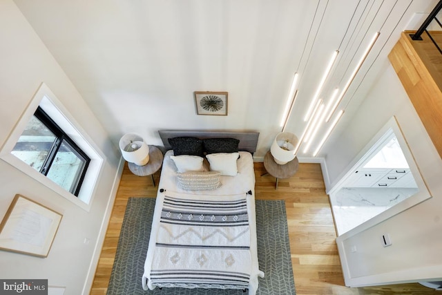 living room with wood-type flooring and plenty of natural light