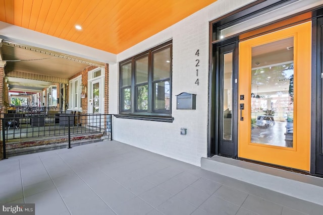 doorway to property with a porch