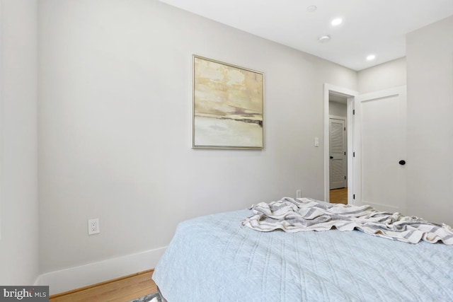 bedroom featuring hardwood / wood-style floors