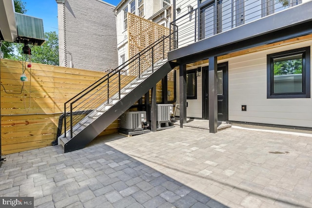 view of patio featuring central air condition unit