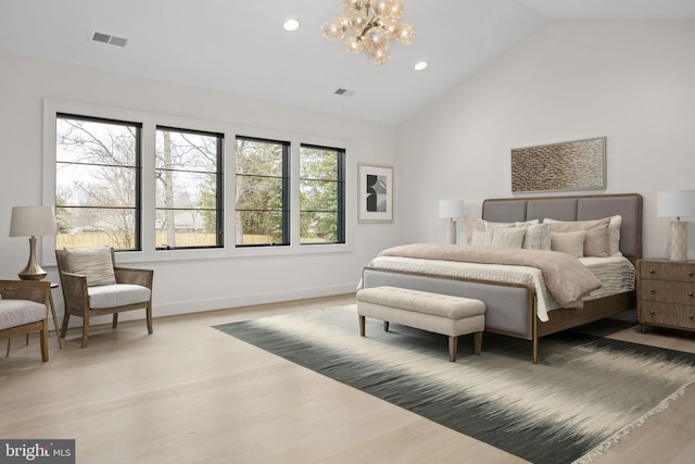 bedroom with light wood-type flooring, baseboards, visible vents, and a notable chandelier