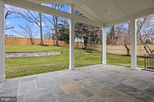 unfurnished sunroom featuring lofted ceiling