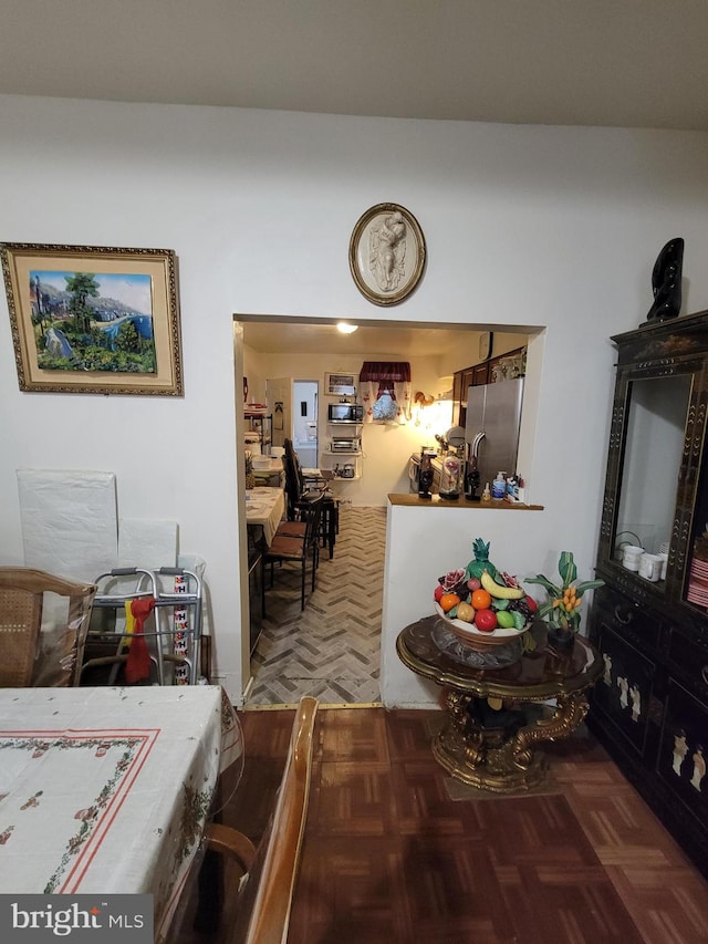 interior space featuring parquet flooring