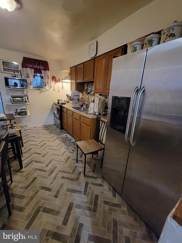 kitchen with stainless steel appliances and sink