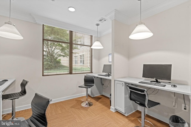 office space with built in desk and crown molding