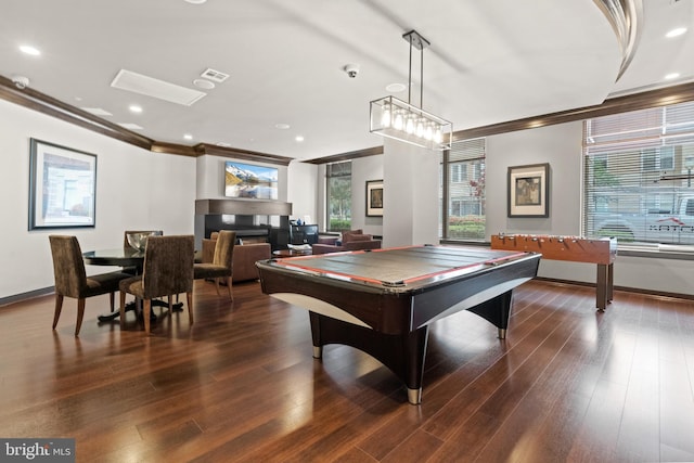 game room featuring dark hardwood / wood-style flooring, ornamental molding, and pool table