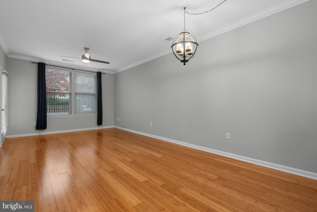 unfurnished room with ceiling fan with notable chandelier, light hardwood / wood-style floors, and crown molding