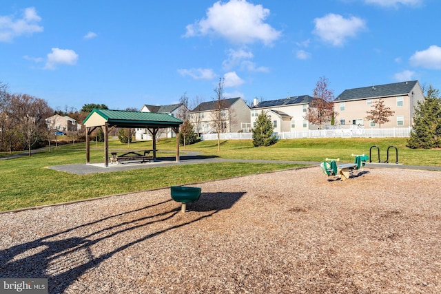 view of playground featuring a gazebo and a lawn