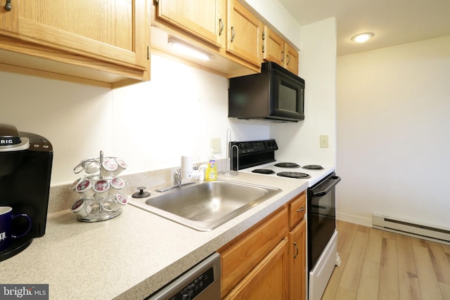 kitchen with sink, light brown cabinetry, light hardwood / wood-style flooring, range with electric cooktop, and baseboard heating