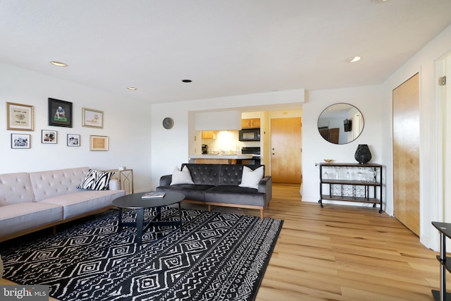 living room with hardwood / wood-style flooring