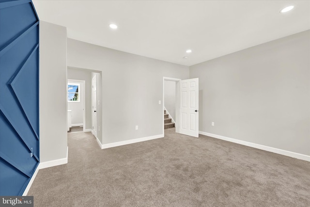 unfurnished bedroom with carpet